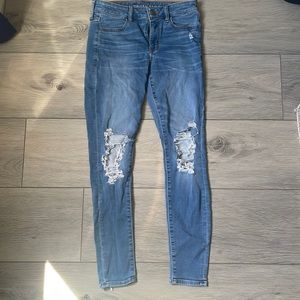 Medium Wash American Eagle Distressed Jeggings.